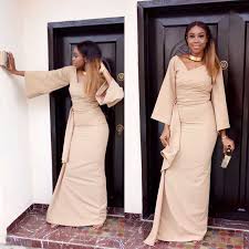 Style Stalking Maria Okan Is The Perfect Wedding Guest In A Chic Wrap Dress
