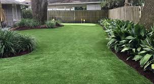 A backyard putting green such as this one is perfect for the homeowner with a quaint backyard but a large passion for golf. Backyard Putting Greens How We Build Them Grass 365 Jacksonville