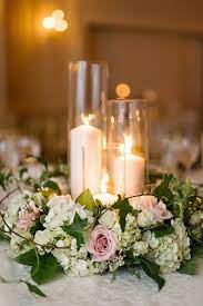 See more ideas about floating flower centerpieces, floating candles, floating flowers. Winter White White Floral Centerpieces Pillar Candle Centerpiece Wedding Hydrangea Centerpiece Wedding