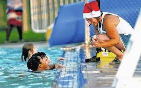 This funny pool party or vacation top makes a unique gift idea for anyone having a christmas in july party with decorations. Christmas In July Pool Party A Big Hit In Kingston Times Leader
