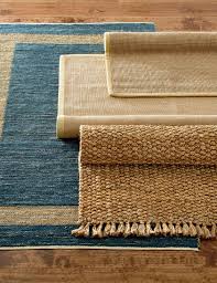 Natural Fiber Rugs Offer A Great Contrast To Wood Floors Add A Little Texture To Your Room With A Jute Or Sisal Rug To Contr Rugs Natural Fiber Rugs Area Rugs