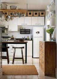 Small Kitchen Storage Put Baskets Above The Cabinets Decorating Above Kitchen Cabinets Kitchen Design Small Above Kitchen Cabinets