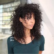 Divide your hair into straight parts and lightly twist the ends with a this styling is ideal for women with curly, stiff hair. These Haircuts Are Going To Be Huge In 2021 Curly Hair Styles Naturally Curly Hair Trends Curly Hair Styles