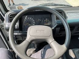 Image result for Medium Green 2004 Isuzu