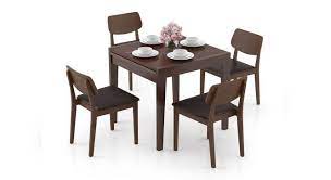 Our dining sets have been designed with very different personalities in mind. Murphy 4 To 6 Extendable Lawson 4 Seater Dining Table Set Urban Ladder