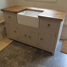 It gives a calming color combination of the white cabinet and the brown countertop. Kitchen Sink Unit Free Standing Solid Pine With Belfast Sink And Pine Worktop In Home Furn Kitchen Sink Units Free Standing Kitchen Units Freestanding Kitchen