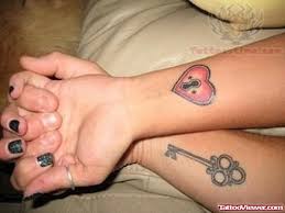 One partner has the lock and the other partner has the key. Key To My Heart Couple Tattoo