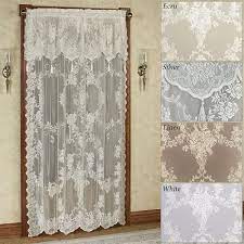 This sheer lace tier with an oversized multiflora design and scalloped hem lets light in softly while bringing exquisite style. 9 Beautiful And Stylish Lace Curtain Designs Styles At Life