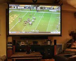 With the way the state of the art is advancing, if your den or living room has the right characteristics, your next tv could well be a projector. Projectors Vs Tvs Should You Ditch Your Flat Screen For A Projector