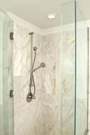 Just Because Your Bathroom Is Small Doesn T Mean That It Has To Look Or Feel That Way Ther Marble Showers Cultured Marble Shower Cultured Marble Shower Walls