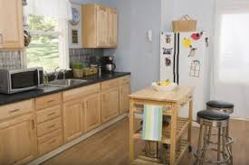 with light colored oak cabinets