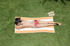 Backyard sunbathing nude