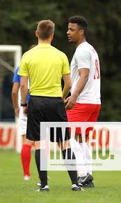 Simon mensah ETV mit Schiri Tim Kossek Fussball Herren , Landesliga Hamburg  , Hammonia Staffel am