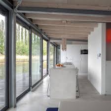 The Urban Rental A Modern Houseboat In Berlin Remodelista Floor To Ceiling Windows Floating House House