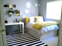 It is a light warm gray with subtle green undertones that you will never see and a flash of purple in cooler light. Yellow Gray And White Bedroom New Photo Of Grey Atmosphere Ideas Pink Flowers Colors Walls Orange Chevron Parakeet Apppie Org