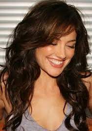 Curly layers add dimension to the face and bring the attention to your facial features. Pin By Cora Holmes On Beauty Long Brunette Hair Haircuts For Wavy Hair Hair Styles