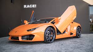 What is luxury without a fancy car to. Local Lamborghini Huracan Given Proper Lambo Scissor Doors Auto News