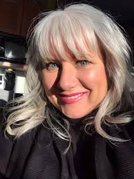 Should I do some low lights ? And or highlights? I have wavy long hair and  it's naturally this way. 57 is my age , any ideas for a change is  appreciated.