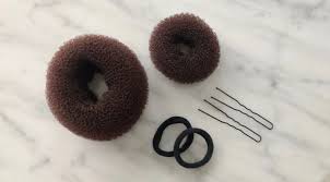 To make a bun with 2 hairbands, tie a ponytail and find its center. Sleek Low Donut Bun For Shorter Or Fine Hair