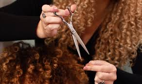 The hair is first washed and cared for, then cut wet. All About Dry Cutting Hair Devacurl Blog