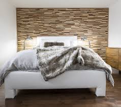 The gorgeous architectural details in the wood panels create a stunning detail. View 27 Bedroom Wooden Wall Paneling Design