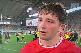 A LATE try from Dan Edwards clinched Wales a tense 31-22 win over Japan in  Kobe this morning. After leading 21-10 at half-time, Wales saw their lead  cut to 24-22 as Japan