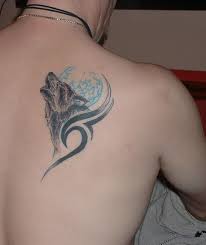Tribal Wolf Moon Tattoo On Right Back Shoulder Wolf And Moon Tattoo Tattoos For Guys Wolf Tattoo Design