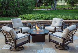 Combining a fire pit with a coffee or dining table marries the best of both worlds into a focal piece that. Copper Fire Table Hammered Copper Gas Fire Table Oriflamme Fire Pit Table Set Outside Fire Pits Fire Pit Sets