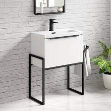 Add style and elegance to your bathroom with our selection of black vanity units and bathroom storage cabinets; Harbour Status 600mm Wall Hung Vanity Unit Basin Gloss White With Matt Black Frame Tap Warehouse