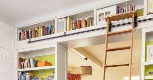 The ladder, which was on a rod, could be used for reaching the top cabinets and shelves. 7 Surprising Built In Bookcase Designs This Old House