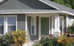 Up top is mastic vinyl shake siding and the bottom is mastic vinyl dutch lap, both in rockaway gray. Mastic Home Exteriors Product Reference Page