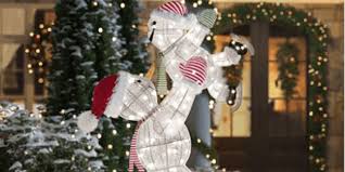 Create a new garden feature with a solar plant stand or light. 16 Festive Outdoor Christmas Decorations Worth Buying