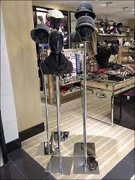 Putting Heads Together With Hats Fixtures Close Up