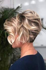 Wavy Long Pixie With Blonde Highlights Shorthaircuts Shorthairstyles Shorthair Ha Latest Short Hairstyles Thick Hair Styles Short Hairstyles For Thick Hair