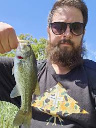 Shifty-eyed fisherman... tempted, but I left him behind at Scooby's  antiques in Carson City NV.