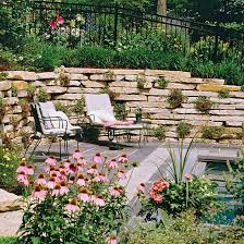 This Planting Guide Solves All Of Your Sloped Garden Problems Sloped Garden Backyard Landscaping Designs Garden Problems