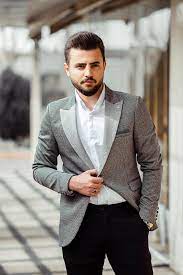 Change the tie or the shirt and it becomes a whole new outfit! Man In Gray Suit Jacket And Black Dress Pants Photo Free Iran Image On Unsplash