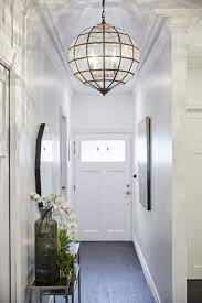 A Guide To Get The Best Out Of Your Hallway Decoration Hallway Lighting Small Entryway Ideas Narrow Hallways Small Entryways