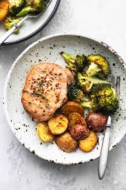 These easy, baked stuffed pork chops are made in the oven with boneless chops and leftover or stovetop stuffing. Sheet Pan Pork Chops With Potatoes And Broccoli Creme De La Crumb