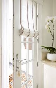 French door window treatments inspiration for a farmhouse living room remodel in providence horizontal shades almost disappear when closed. 3 Ways And 23 Ideas To Cover French Door Windows Shelterness