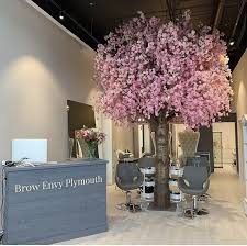 Welcome to our hair salon. Artificial Pink Blossom Tree Brow Envy Hairdressers Beauty Salon Decor Beauty Salon Design Beauty Salon Interior