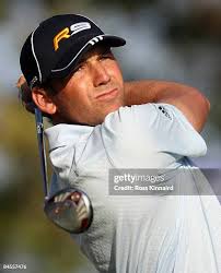 Sergio Garcia of Spain with top coach Peter Cowen and his caddie... News  Photo