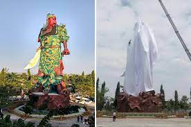 Standing in the city of jingzhou in hubei provence, the god of war statue weighs in at an impressive 1,320 tonnes and is 190ft in height. In Indonesia Chinese Deity Is Covered In Sheet After Muslims Protest The New York Times