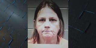 Long Co. woman faces charges in husband's murder