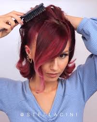 Grande goes for a top knot hairstyle which has brown and black for hair colors. Stella Cini Ariana Grande Hair Facebook