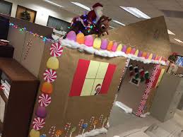 This gingerbread house cubicle gets the award for best use of balloons. Gingerbread House Cubicle This Is What Happens When Event Pla Christmas Cubicle Decorations Office Christmas Decorations Office Christmas Decorations Contest