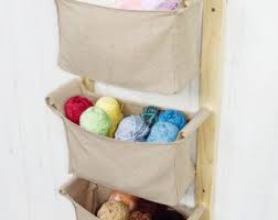 This Gorgeous Set Of Hanging Nursery Storage Baskets Is Ideal To Hang Near The Changing Table Or On Storage Kids Room Storage Room Organization Storage Baskets