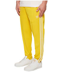It is organised by bayern munich before the beginning of the season, and played between the hosts and a guest team at the allianz arena. Adidas Originals Cotton Franz Beckenbauer Trackpants In Yellow For Men Lyst