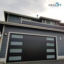 The choice of colour for your garage door is practically limitless, however, some colours may not look right or complement your property. Home Design Trends For 2019 Include Darker Colors Such As Black Steel Garage Doors Garage Door Styles Contemporary Garage Doors Garage Doors