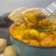 Jamaican curry chicken with dumplings. Jamaican Curry Chicken Recipe Eatwithyoureyesllc Com